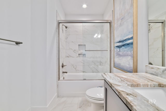 full bathroom with tile floors, toilet, vanity, and combined bath / shower with glass door