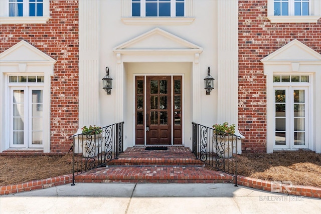 entrance to property featuring french doors