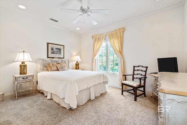 bedroom featuring light carpet, ornamental molding, and baseboards