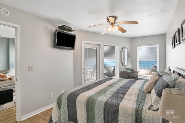 bedroom featuring ceiling fan and light hardwood / wood-style flooring