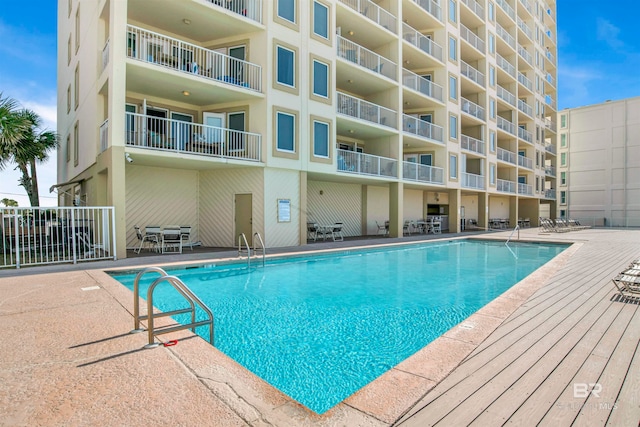 view of pool featuring a patio area