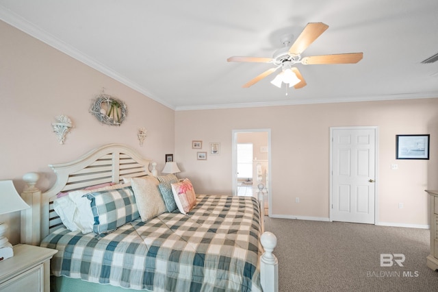 carpeted bedroom featuring ceiling fan and crown molding