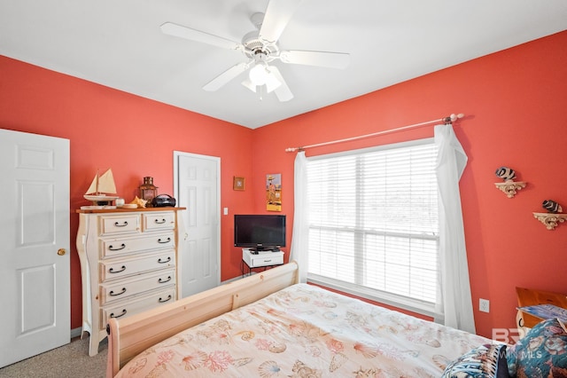 bedroom featuring ceiling fan and carpet floors