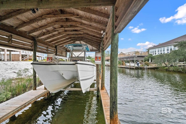 dock area featuring a water view