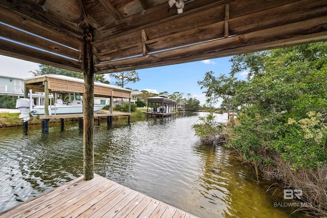 view of dock with a water view