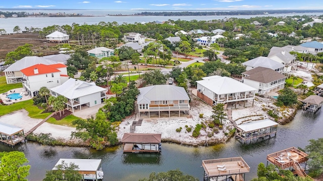 bird's eye view with a water view