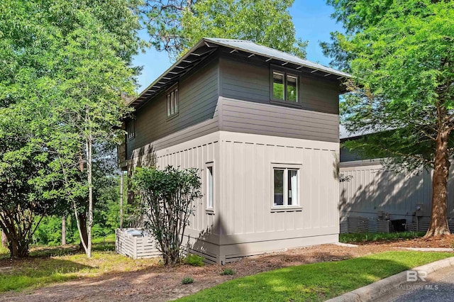 view of side of home featuring board and batten siding