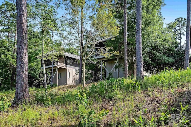 back of property with a deck
