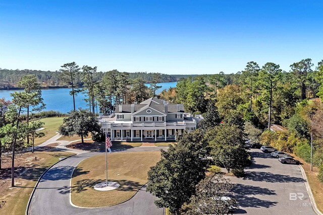 aerial view of a large body of water and a heavily wooded area