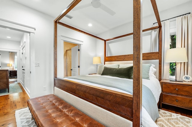 bedroom with hardwood / wood-style flooring, recessed lighting, and ceiling fan