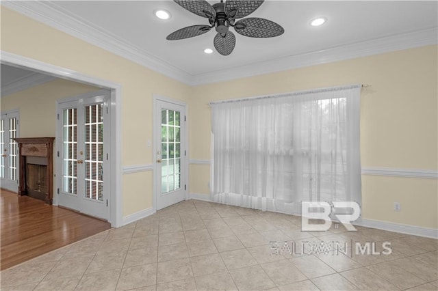 1140 E Dominion Dr, Mobile, AL 36695 - empty room with a ceiling fan, tile patterned floors, ornamental molding, recessed lighting, and a fireplace