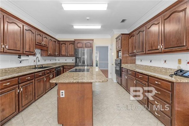 1140 E Dominion Dr, Mobile, AL 36695 - kitchen featuring stainless steel refrigerator with ice dispenser, oven, ornamental molding, a center island, and light stone countertops