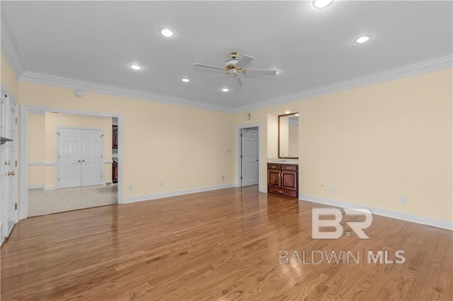1140 E Dominion Dr, Mobile, AL 36695 - unfurnished living room with a ceiling fan, crown molding, light wood finished floors, and recessed lighting