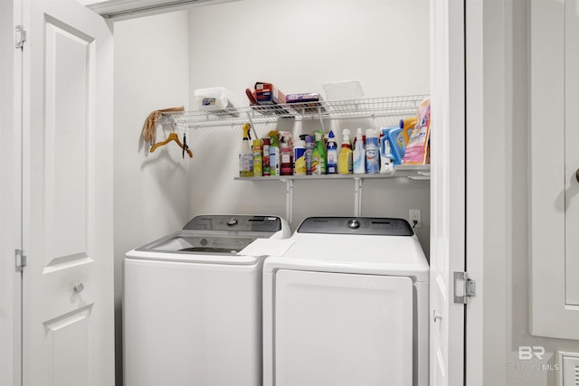 laundry area with washer and dryer and laundry area
