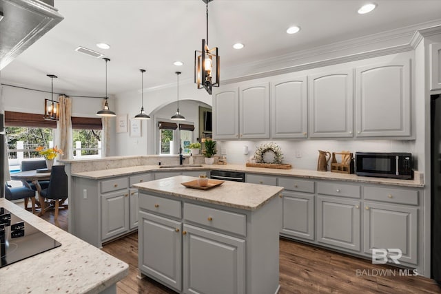 14281 Timber Ridge Dr, Loxley, AL 36551 - kitchen featuring black appliances, gray cabinets, a center island, arched walkways, and ornamental molding