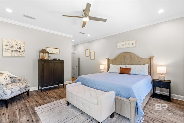 14281 Timber Ridge Dr, Loxley, AL 36551 - bedroom featuring wood finished floors, crown molding, recessed lighting, and a ceiling fan
