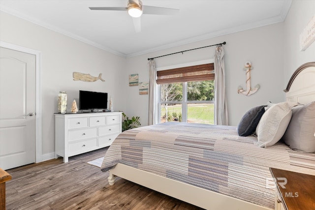 14281 Timber Ridge Dr, Loxley, AL 36551 - bedroom with ornamental molding, wood finished floors, and ceiling fan