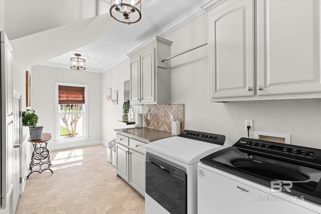 14281 Timber Ridge Dr, Loxley, AL 36551 - kitchen with a chandelier, separate washer and dryer, tasteful backsplash, light tile patterned floors, and ornamental molding