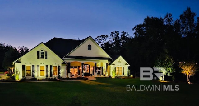14281 Timber Ridge Dr, Loxley, AL 36551 - view of front of property featuring a porch and a front yard