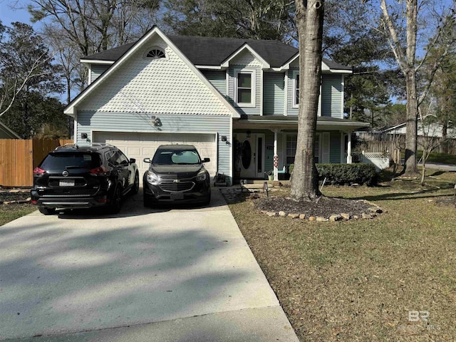 view of front of home featuring a front lawn and a garage