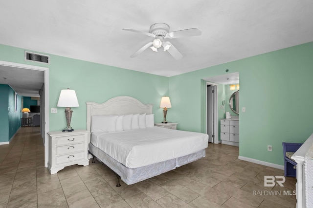 24132 Perdido Beach Blvd Unit 1081, Orange Beach, AL 36561 - bedroom with baseboards and ceiling fan