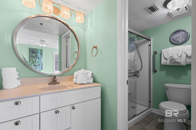 24132 Perdido Beach Blvd Unit 1081, Orange Beach, AL 36561 - bathroom featuring a shower stall, vanity, tile patterned floors, and ceiling fan