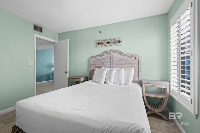24132 Perdido Beach Blvd Unit 1081, Orange Beach, AL 36561 - bedroom with baseboards