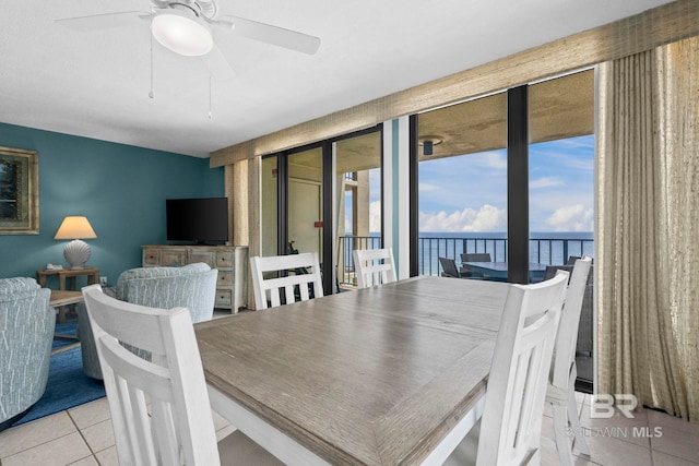 24132 Perdido Beach Blvd Unit 1081, Orange Beach, AL 36561 - tiled dining room with ceiling fan