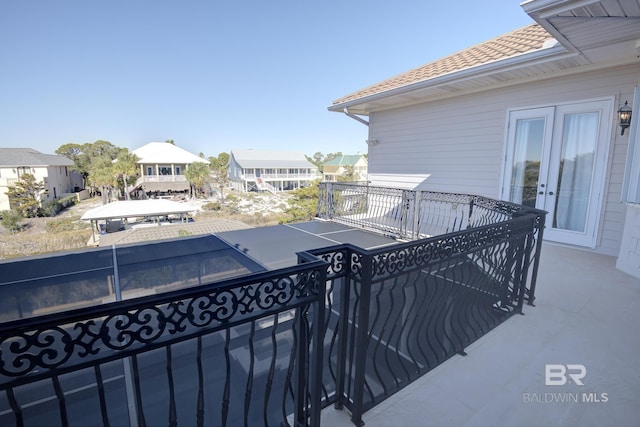 balcony featuring french doors