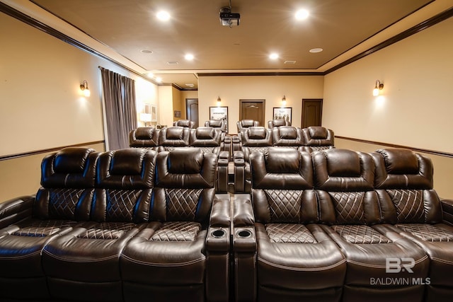 cinema room featuring crown molding