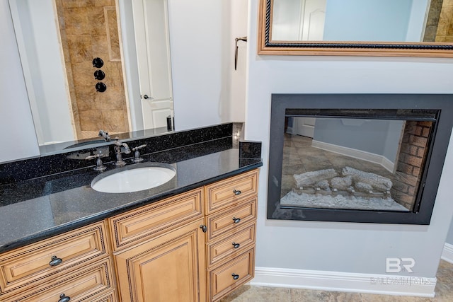 bathroom with vanity and walk in shower