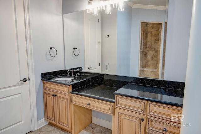 bathroom featuring vanity, tile patterned floors, and crown molding