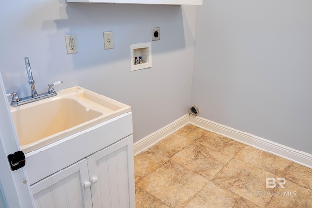 laundry area featuring hookup for a washing machine, cabinets, and hookup for an electric dryer