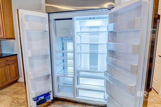 interior details featuring fridge