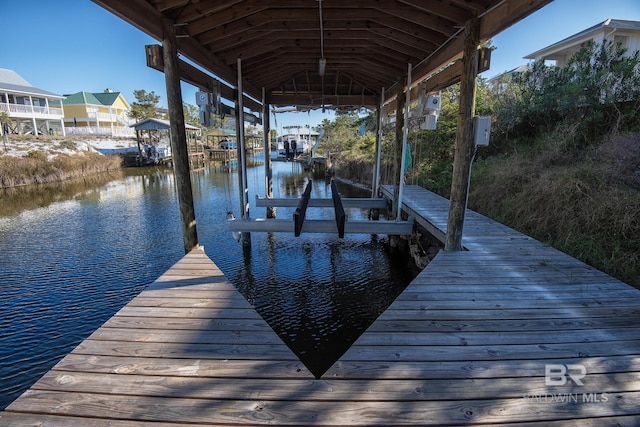 view of dock with a water view