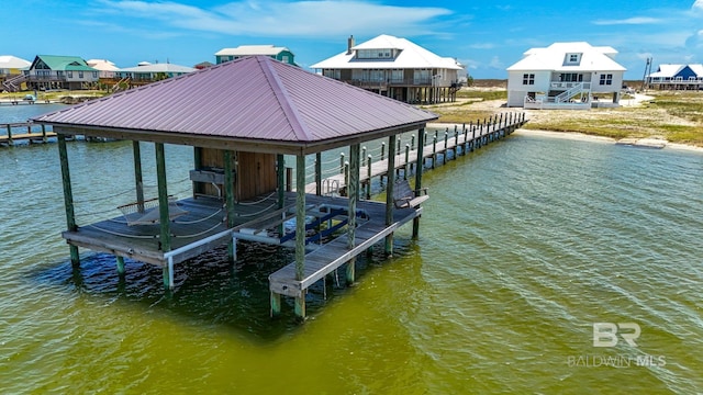 2764 W Beach Blvd, Gulf Shores, AL 36542 - dock area featuring boat lift and a water view