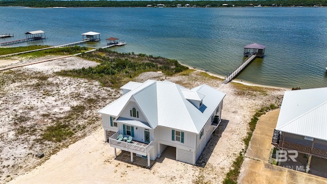 2764 W Beach Blvd, Gulf Shores, AL 36542 - aerial view of property and surrounding area with a nearby body of water