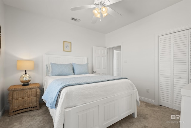 2764 W Beach Blvd, Gulf Shores, AL 36542 - bedroom with light carpet, a closet, and a ceiling fan