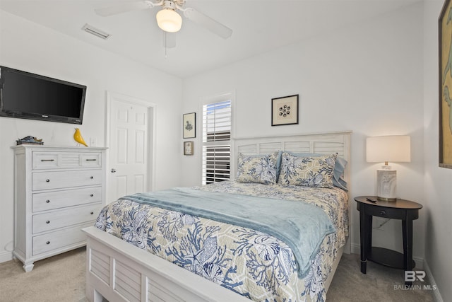 2764 W Beach Blvd, Gulf Shores, AL 36542 - bedroom with light carpet and ceiling fan