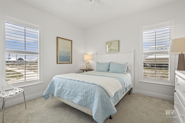 2764 W Beach Blvd, Gulf Shores, AL 36542 - bedroom with light carpet and ceiling fan