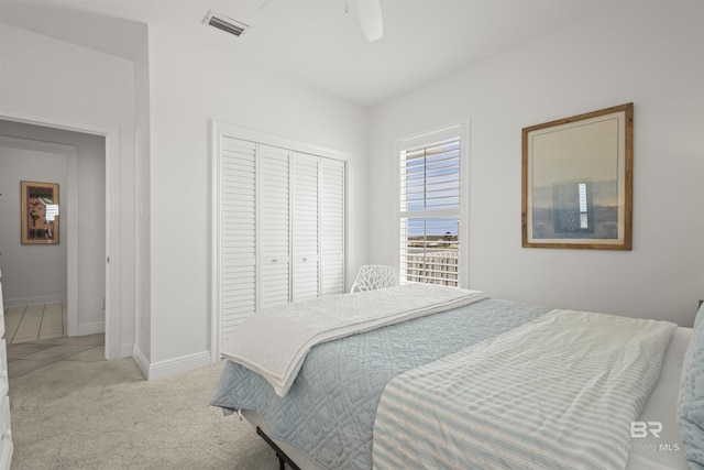 2764 W Beach Blvd, Gulf Shores, AL 36542 - bedroom with a closet, light carpet, and ceiling fan