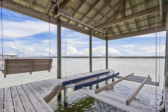 2764 W Beach Blvd, Gulf Shores, AL 36542 - dock area with boat lift and a water view