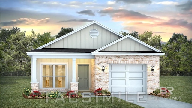 view of front of house with a lawn and a garage