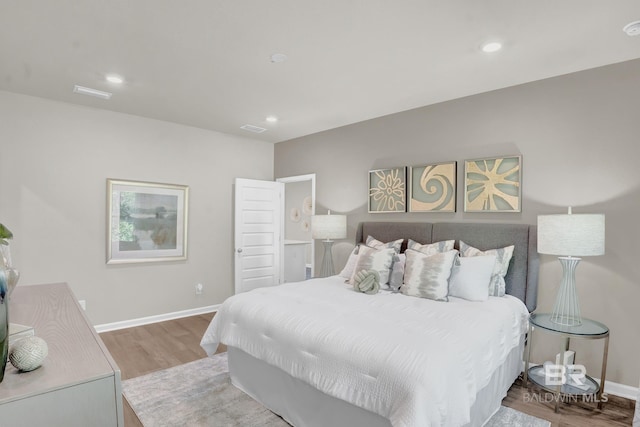 bedroom featuring light wood-type flooring