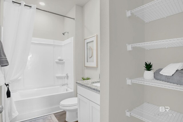 full bathroom featuring wood-type flooring, vanity, toilet, and shower / bathtub combination with curtain