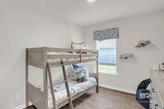 bedroom featuring hardwood / wood-style flooring