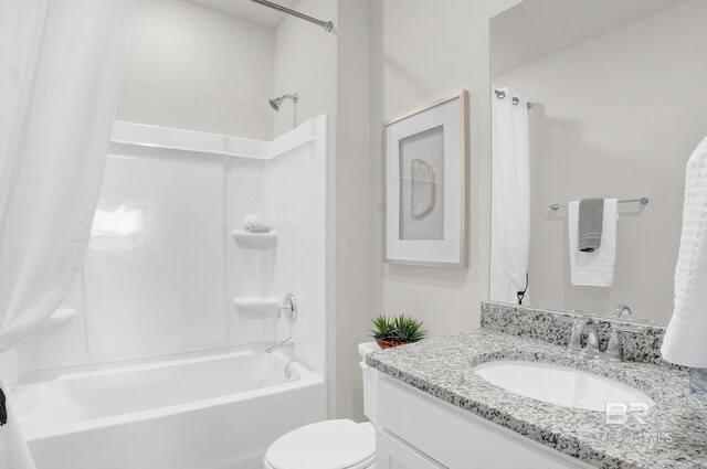 full bathroom featuring vanity, shower / bathtub combination with curtain, and toilet