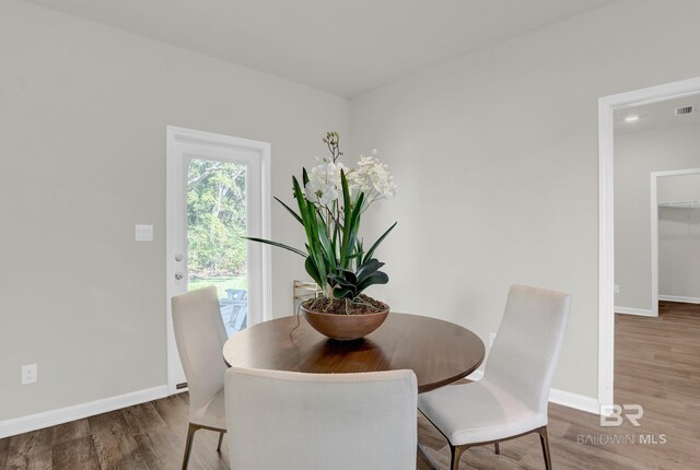 dining room featuring hardwood / wood-style flooring