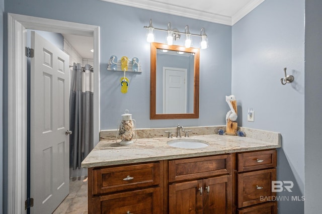 bathroom featuring tile patterned floors, vanity, and crown molding