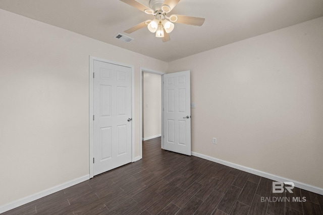 unfurnished bedroom featuring ceiling fan